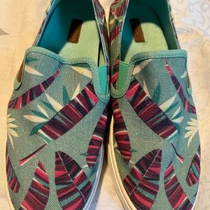 OluKai size 7.5 never worn slip on shoes.